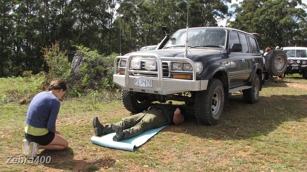 05-Rachel worships the great god Iceman - or is that George checking the oil leak from his diff!.JPG